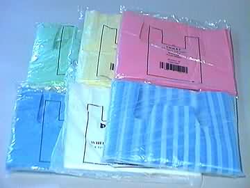 Packets of vest shaped carriers